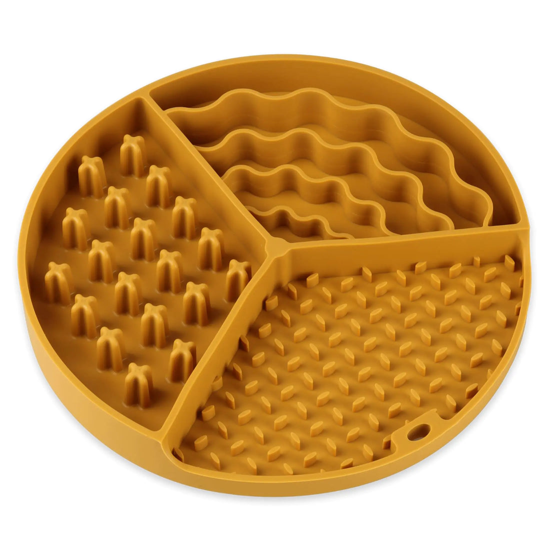 Yellow silicone mat with textured design on a white background